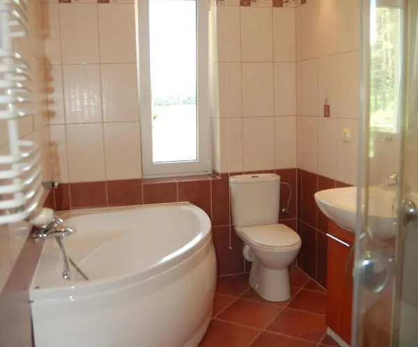 Апартаменты Osrodek Wypoczynkowy Jezioro Studzienice